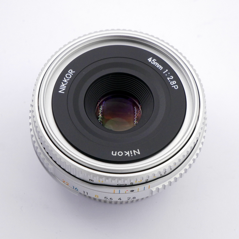 S-H-5AX23L_2.jpg - Nikon MF 45mm F/2.8 P Ais Lens with matching caps, filter and hood  - Image 2
