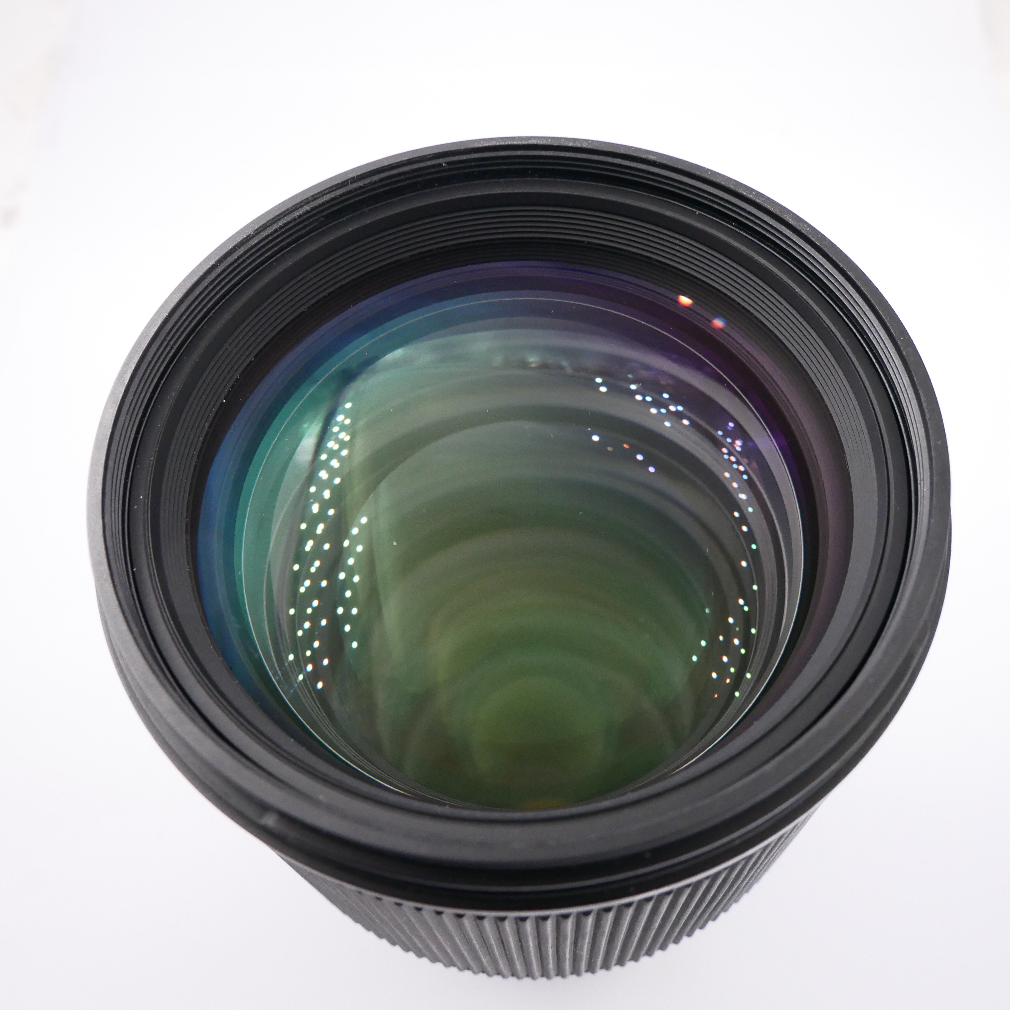 S-H-FEKV42_2.jpg - Sigma 85mm F1.4 DG Lens for Canon EF-Mount - Image 1
