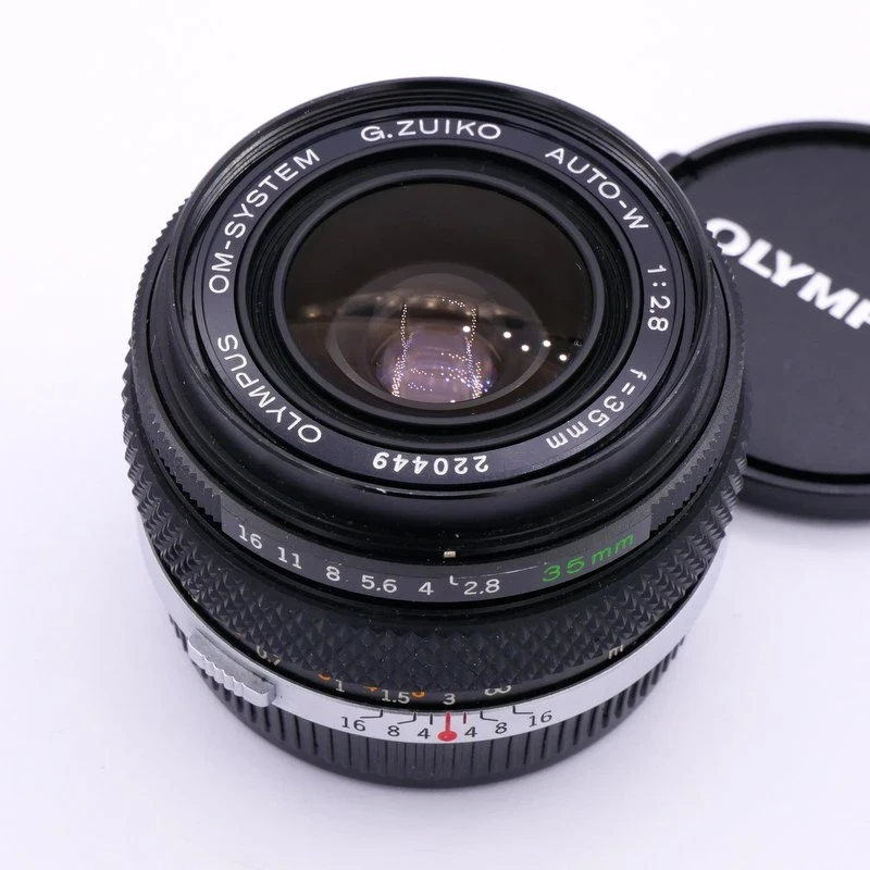 S-H-TV7W6A_2.webp - Olympus MF 35mm F/2.8 Zuiko Lens in OM Mount - Image 1