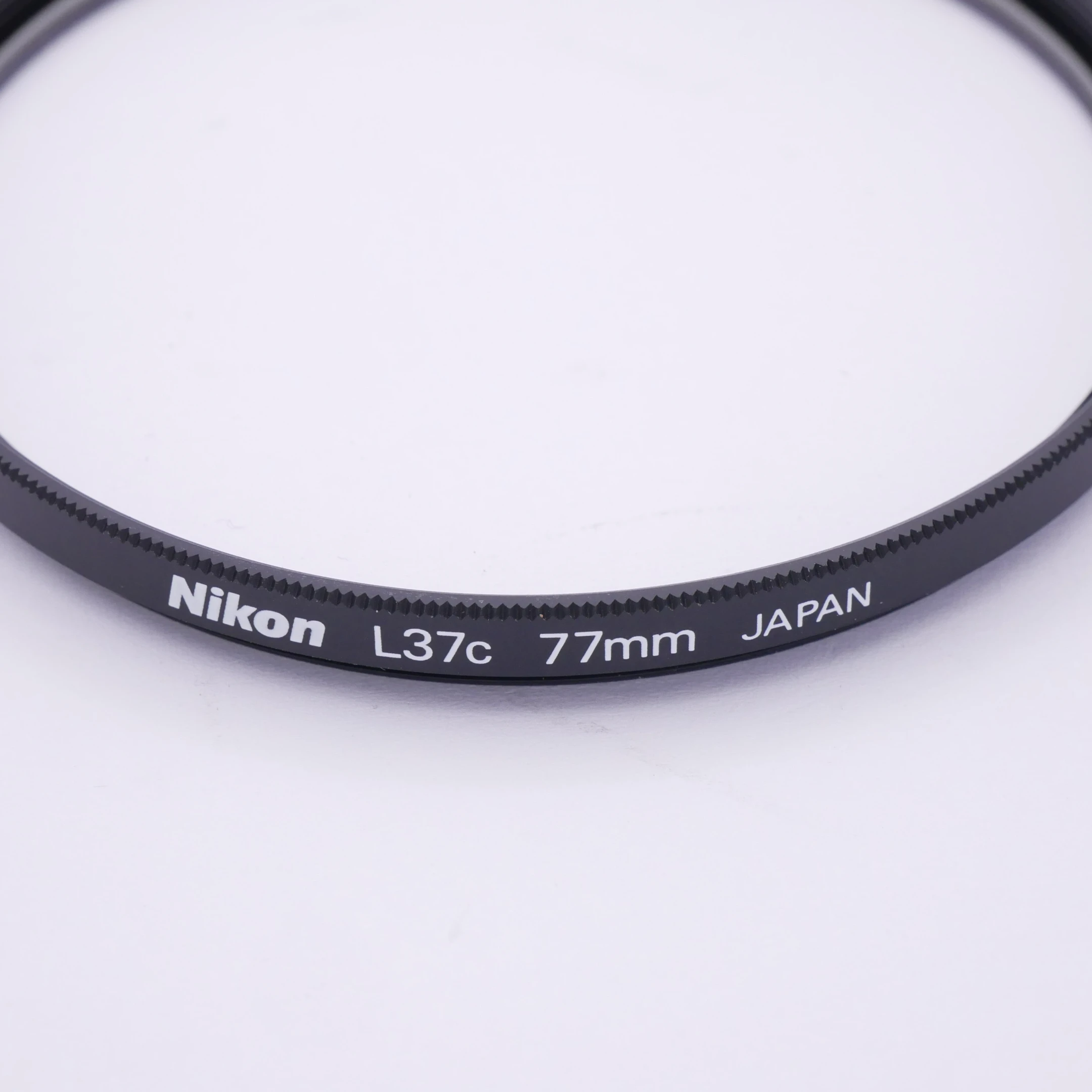 S-H-XEAPV8_2.webp - Nikon L37c 77mm Filter - Thumbnail 1